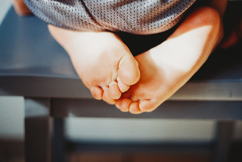 little toes on a stool